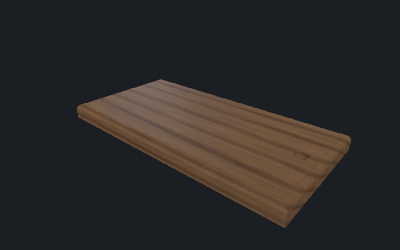 The cutting board — one crosscut, a roundover, a hanging hole. Walnut, recently color-matched to a real board.